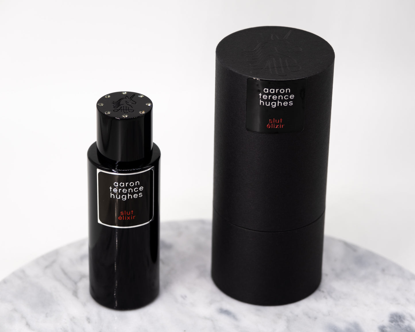Aaron Terence Hughes Slut Elixir perfume bottle and box