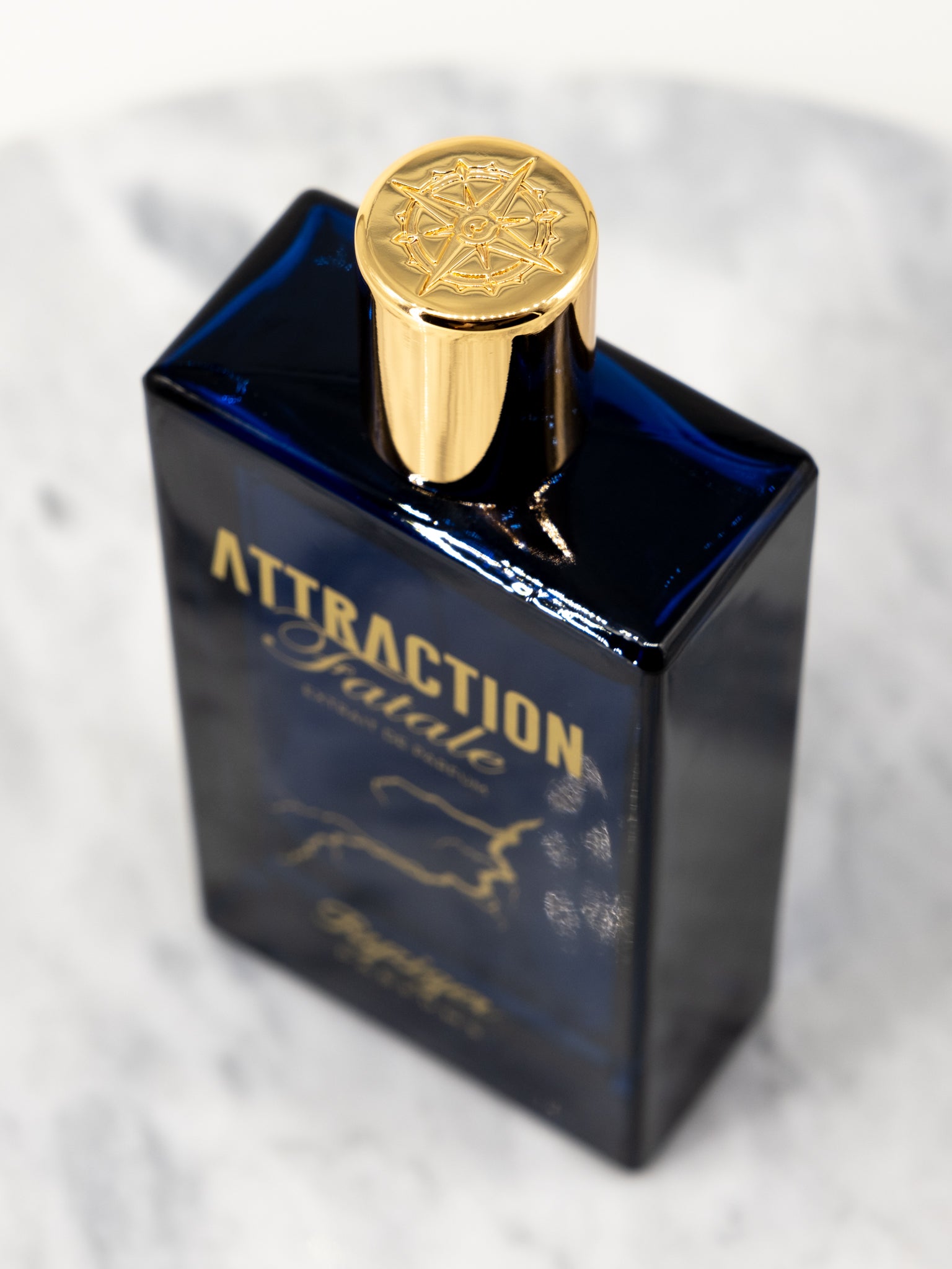 Attraction Fatale by Ryziger Parfums perfume bottle cap design