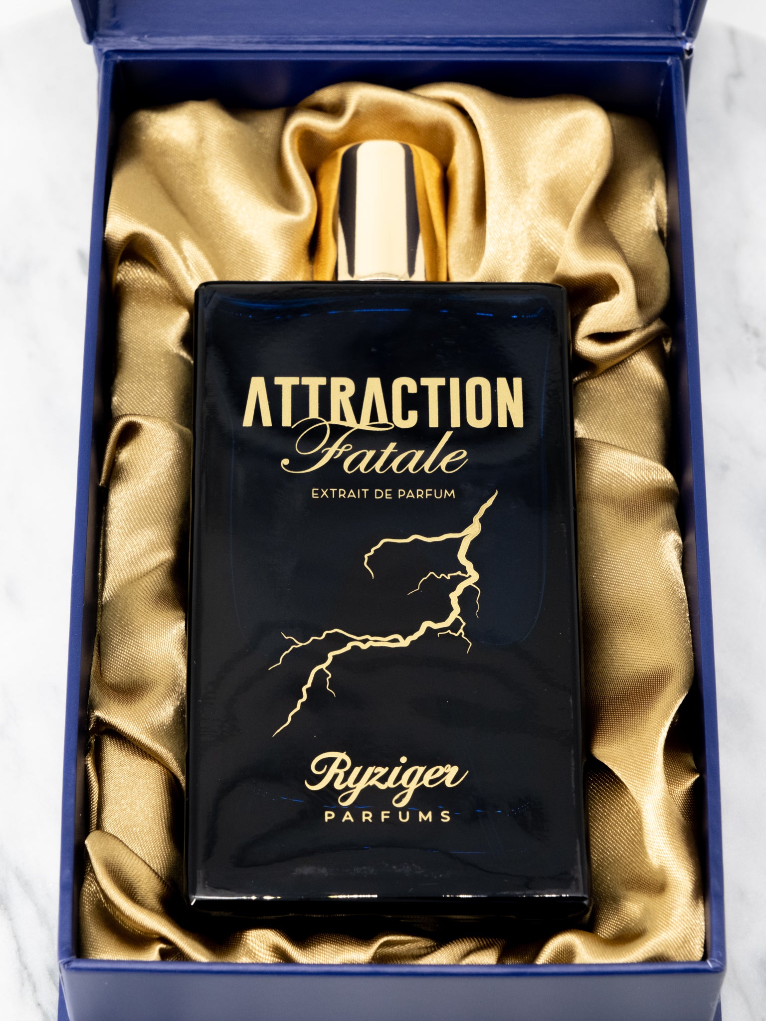 Attraction Fatale by Ryziger Parfums close up in box