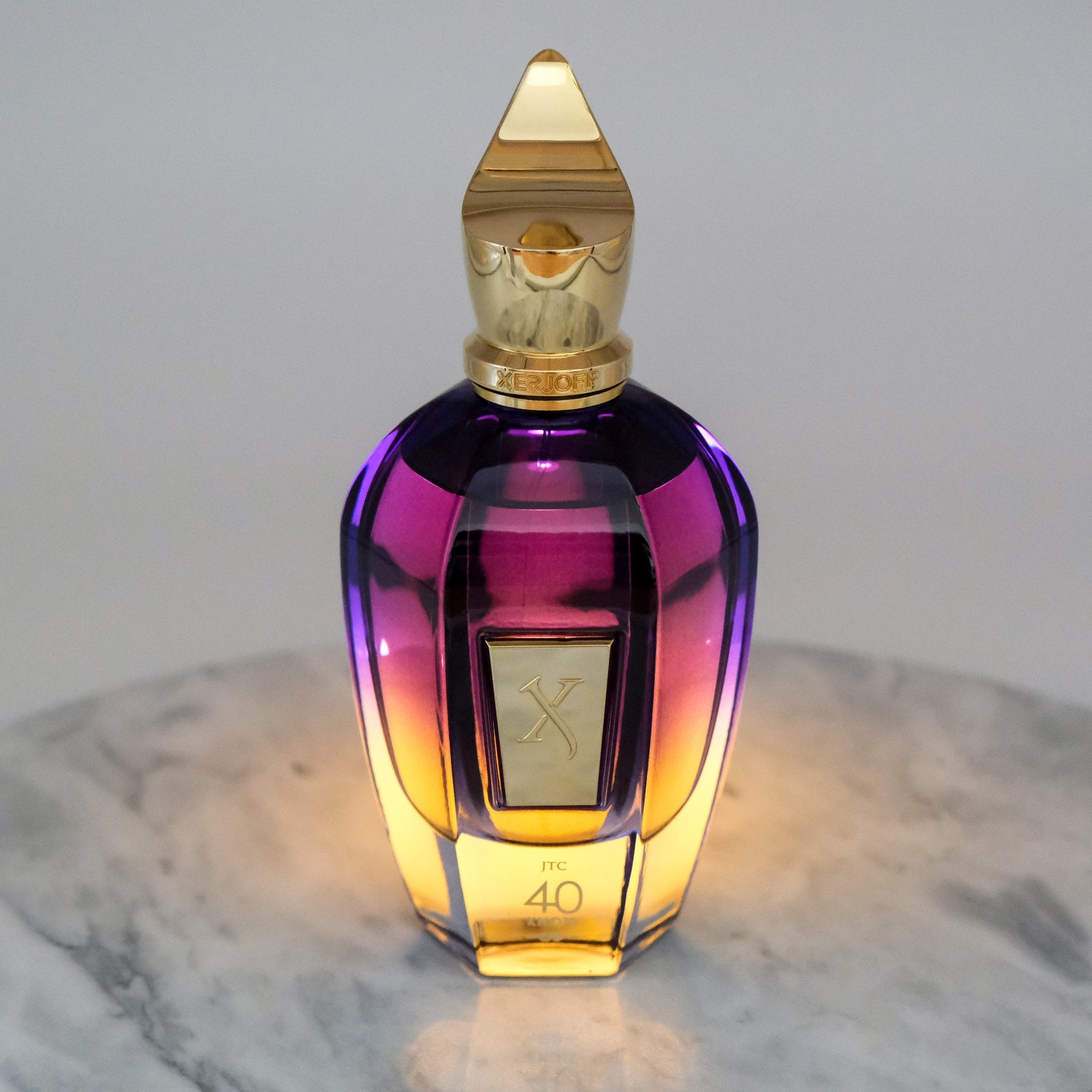 Xerjoff Join the Club 40 Knots perfume bottle backlit