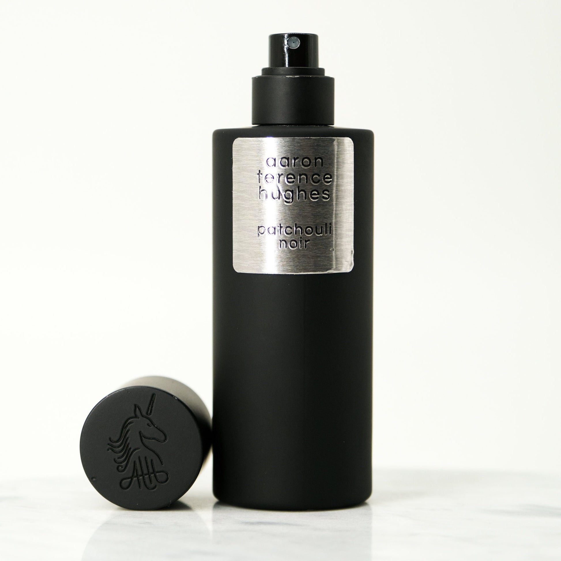 Aaron Terence Hughes Patchouli Noir perfume bottle and cap